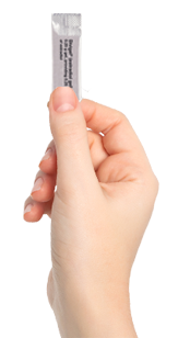 Hand holding a Divigel® (estradiol gel) discreet packet.